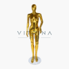 Mannequin de vitrine femme en plastique or brillant avec tête abstraite